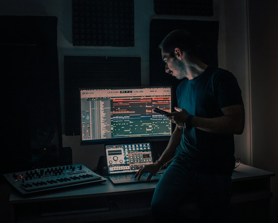 Music producer in studio — illustrative photo by Rezli